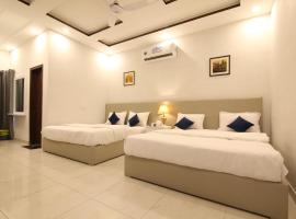Cuzzy Inn Hotel，位于拉合尔的酒店