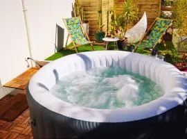 Superbe appartement avec jacuzzi avec jardin privé