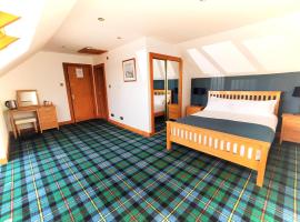 Oban Suites and Lodges by the Sea，位于奥本的酒店