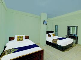 SPOT ON 91540 Ukuh Guesthouse，位于普兰巴南的酒店