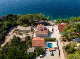 Seaside family friendly house with a swimming pool Brna - Vinacac, Korcula - 9266，位于普利兹巴的度假屋