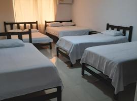 Hotel casa real buga，位于布加的酒店