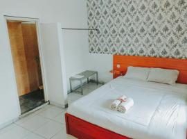 De Luck Homestay near Alun Alun Sidoarjo，位于诗都阿佐的酒店