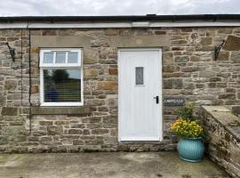 Milecastle Inn on Hadrian's Wall near Haltwhistle，位于霍特惠斯尔的酒店