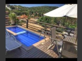 Casa em Geribá ampla duas suítes com piscina e vista dentro de condominio，位于布希奥斯的酒店