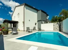 Family friendly apartments with a swimming pool Soline, Krk - 9715