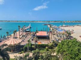 Porto marina resort &Spa，位于Dawwār al Ḩajj Aḩmad的酒店