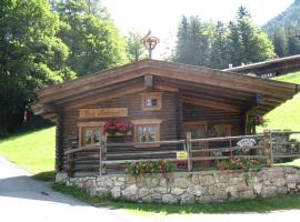 Almbrünnerl die Almhütte auf der Raffner Alm，位于鲁波尔丁的酒店