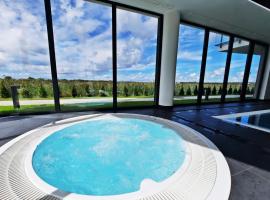WESTIN HOUSE Kołobrzeg LUX - BASEN, JACUZZI, SAUNA, SIŁOWNIA, PLAC ZABAW W CENIE - 365PAM，位于科沃布热格的酒店