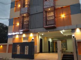Hotel Rhythm Grand Suite，位于蒂鲁奇奇拉帕利的酒店