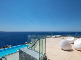 Seafront luxury villa with infinity pool & devine views!，位于阿基欧斯帕夫洛斯的酒店