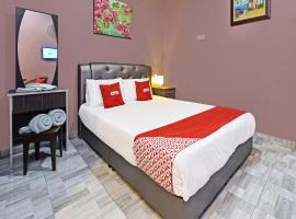 OYO Home 90348 Inspire Rooms，位于珍南海滩的酒店