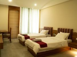 Chang's Garden & Resort，位于Golāghāt的酒店
