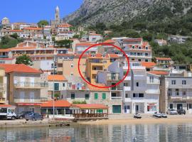 Apartments by the sea Igrane, Makarska - 18405，位于伊格拉恩的酒店