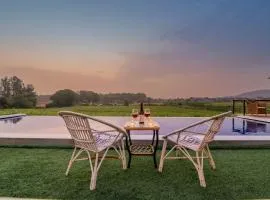 SaffronStays Onellaa, Nashik - infinity pool villa surrounded by a vineyard