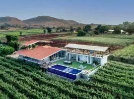 SaffronStays Onellaa, Nashik - infinity pool villa surrounded by a vineyard
