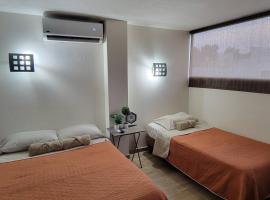 Bonito Departamento con 2 camas con clima, parking, wifi 110mb, ,cocineta, 8，位于巴耶斯城的公寓