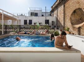 Oasis Backpackers' Hostel Sevilla & Coworking，位于塞维利亚的酒店