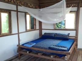 ZIONZURI ARTS ECOVILAGE TREE HOUSE，位于Mbwamaji的酒店
