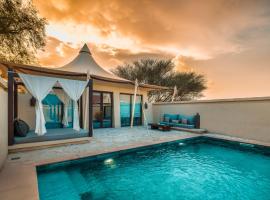 Desert Nights Resort，位于Shāhiq的豪华帐篷