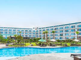 Hallim Resort，位于济州市明月台附近的酒店