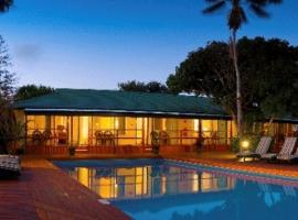 Paradise Hotel & Resort，位于Kingston的酒店