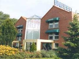 Le Tour Hôtel Du Golf，位于贝休恩的酒店