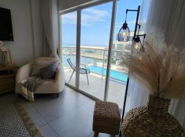 ARUBA DREAM GETAWAY 2BR/2BT OCEAN & POOL VIEW，位于奥拉涅斯塔德的酒店