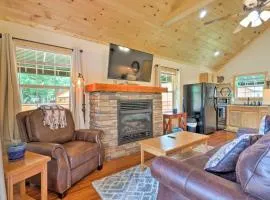 Cozy Riverfront Cabin with Private Deck and Hot Tub!