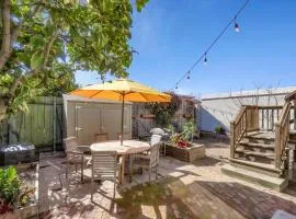 Light filled Condo with enclosed sunny backyard