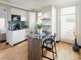 J Huus 4 I 99m I Strand I Kurplatz I EG I Terrasse I Ruhig I King I FB Heizung I Privateingang I Huus Design，位于诺德奈的Spa酒店