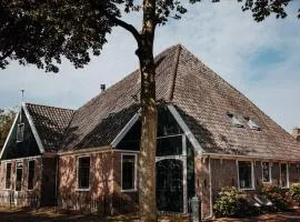 Monumentale stolpboerderij voorzien van alle gemakken van nu!