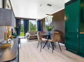 Leilighet Beitost&oslash;len sentrum, terrasse og innend&oslash;rs parkering，位于贝特斯托尔的Spa酒店