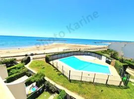 Appartement 1ere ligne piscine terrasse au bord de la plage front de mer avec 6 vélos