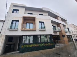 OIKOS APARTAMENTOS TURÍSTICOS，位于莫内斯特里奥的酒店