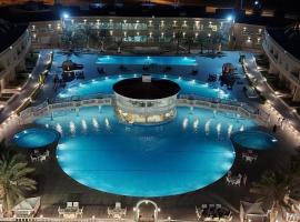 Al Salam Grand Hotel，位于阿尔布亚米艾因国际机场 - AAN附近的酒店