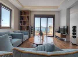 Regina's Residence - One Bedroom Apartment with Sea view，位于普兹诺的酒店