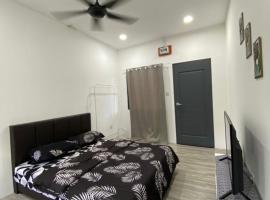OYO Homes 90650 Na Homesuite，位于拉瑙的酒店
