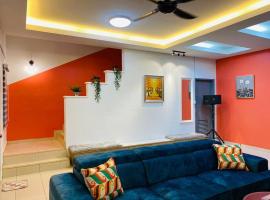 THE GREEN-SEMENYIH HOMESTAY FAMILY SUITES 8-10 PAX，位于士毛月的带停车场的酒店