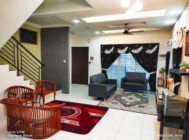 Sweet40 Homestay，位于Kampong Batu Lapan的度假屋