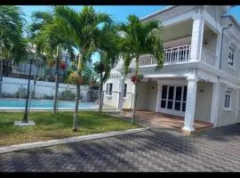 Villa Palmira 6 suites avec piscine 5 min à pied de la plage Pereybere