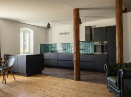 Designwohnung auf Gutshof mit Sauna zw. L/DD，位于Mügeln的公寓