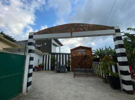 RedDoorz @ Piamonte Apartelle Santo Tomas Batangas，位于Santo Tomas的酒店