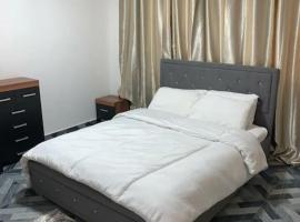 Lovely 1-bedroom rental unit for short stays.，位于特马的公寓