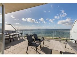 Apartment with Oosterschelde view，位于Scherpenisse的酒店