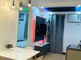 1BEDROOM Condo Unit with Free Pool, HBO, Netflix & WiFi，位于达沃市的酒店