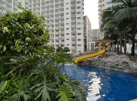 Yam Staycation Shore Residences，位于马尼拉菲律宾库内塔体育馆附近的酒店