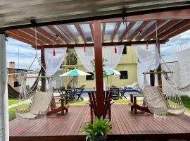 Casa Boto Tucuxi 1，位于新艾朗的带泳池的酒店