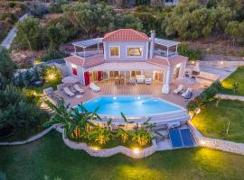 Villa Socrates，位于斯卡拉卡米尼亚海滩附近的酒店