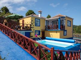 CASA ALBA, casa rústica en la colina con piscina-spa climatizada y vistas al mar，位于蓬塔利亚纳的酒店